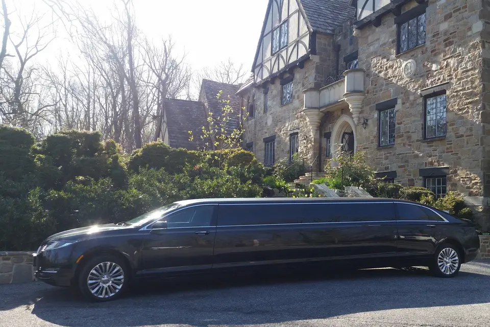 White stretch limousine for wedding at The Grand America Hotel Salt Lake City
