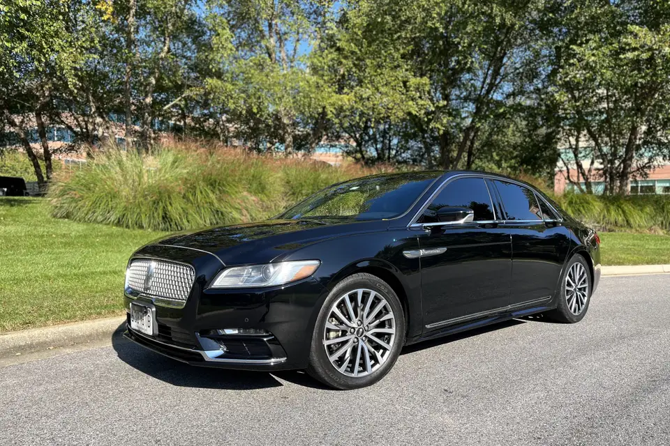 White stretch limousine for wedding at The Grand America Hotel Salt Lake City